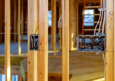 Electrical socket boxes on wooden beams